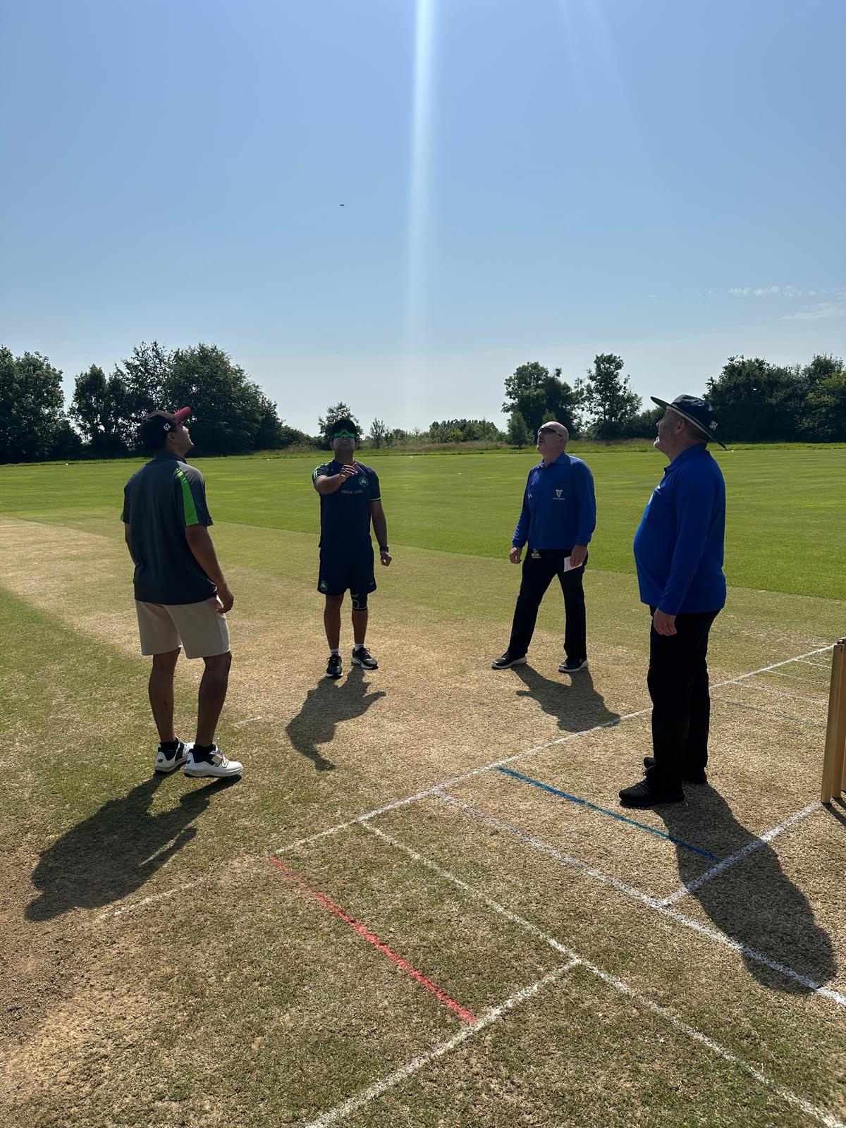 The toss ahead of the Over 40's Inter Regional match